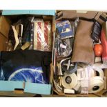 A mixed collection of items: auto touch up paint, car seat covers, note pads, adapters etc (2