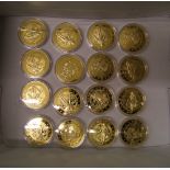 A collection of gold plated Barbados Black Beard 25 cent coins (16)