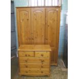 Goldcrest furniture limited 3 door / 3 drawer pine wardrobe: width 122cm together with a matching