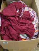 A large collection of ladies tops: various sizes and styles.