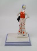 Wedgwood Clarice Cliff deco figure Lido Lady: in orange. Boxed