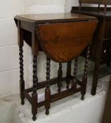 Early 20th century Sutherland table: raised on barley twist supports