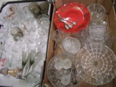 A collection of glass ware: to include condiment pots, sugar tongs, jelly mould, cake stand, glasses