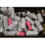 A mixed collection of hair and beauty products: shampoo, hair dye, talc etc.