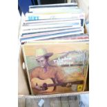 A mixed collection of 1960's & 70's Lps to include: Hank Locklin, Hank Williams, Emmylou Harris,