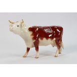 Beswick early Hereford cow 948: horns pointing forward, in dark chestnut colour.