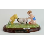 Royal Doulton Winnie the pooh tableau figure: Eeyore Lodes a tail, with wood plinth.