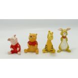 Beswick Christopher Robin figures: comprising Christopher Robin, Piglet, Tigger and Rabbit. (4)