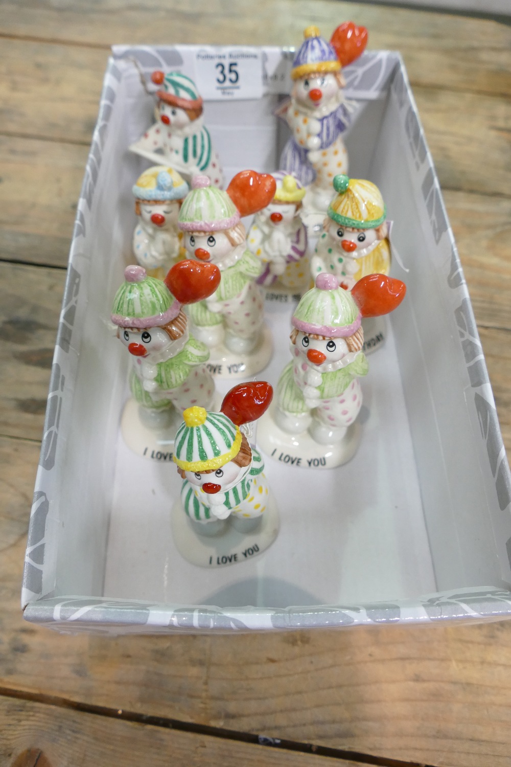 A collection of Beswick little lovable clowns (9):