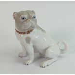 Museo porcelain model of a seated pug dog: height 17.5cm.