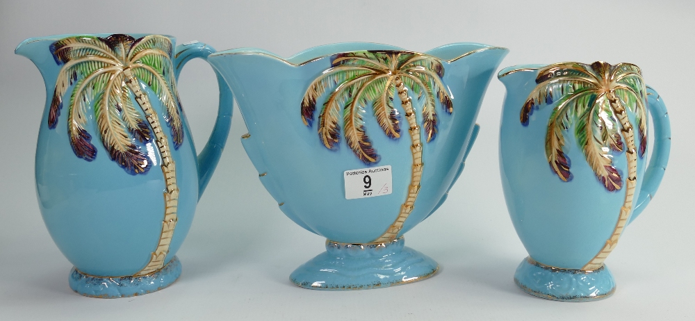 A collection of Beswick light blue Palm vases: and Jugs (3)