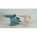 Beswick blue gloss matchbox holder as a pelican 497: and a similar cream example. (2)