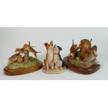 Beswick countryside studio sculptures dog groups: comprising Hide and seek (tail detached), Puppy