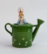 Schmid Beatrix Potter musical figure: Peter Rabbit in the watering can.