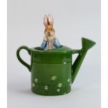 Schmid Beatrix Potter musical figure: Peter Rabbit in the watering can.