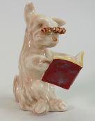 Beswick Ware comical model of a dog reading :with spectacles 831.