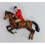 Beswick wall plaque as huntsman on jumping horse:1505.