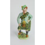 Beswick figure of a scotsman 1125: