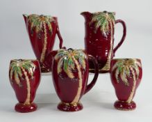 A collection of Beswick Red Palm vases and Jugs: tallest 21cm. (5)