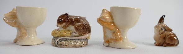 Beswick items: including pair cat egg cups, small rabbit and harvest mouse. (4)