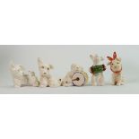 A collection of Beswick comical dogs: including toothache dog, dog playing accordion, dog asleep