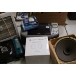 A mixed collection of items: vintage Althom speaker, photocopier, stove, speakers etc.