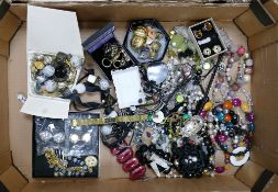 A collection of costume jewelry to include: watches, earrings, beads, chains etc