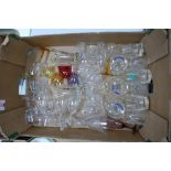 A collection of Quality glass ware including: port glasses, coloured glassware, etched whiskey
