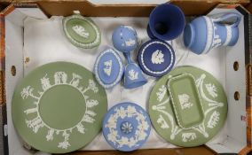 A collection of multi coloured Wedgwood japerware to include: vases, plates, lidded boxes