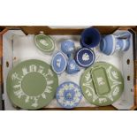 A collection of multi coloured Wedgwood japerware to include: vases, plates, lidded boxes