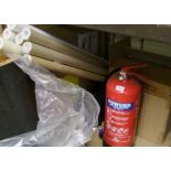 A mixed collection of items: large heavy duty door mat, fire extinguisher, till rolls etc.