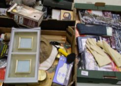 A mixed collection of items: picture frames, lamps, clocks, door stops etc (3 trays).