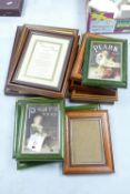 A collection of framed small empty wall frames(16):