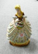 Italian Pottery Figure of Lady with Basket of Flowers: height 28cm