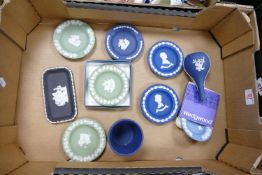 A collection of multi coloured Wedgwood Jasperware to include: pin trays, vases, small planter etc