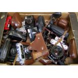 A collection of vintage cameras: to include Zenit V, Zenit 3M, Kodak Retimette IB, Voigtlander