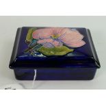 Moorcroft box with lid in Anemone pattern: Measures 12.5cm wide. Impressed mark with label.