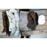 Collection of 7 fur items: Collar, stoles, wraps and a hat. (7)