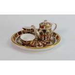 Royal Crown Derby Imari pattern miniature tea set and tray: Tray measures 19.5cm wide. All 4