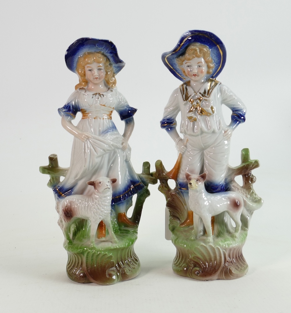 19th century German Shepherd and Shepherdess figures: Pair measuring 25cm high approx. (2)