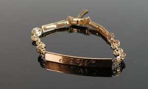 9ct gold bracelet with engraved initials: Weight 6.9g.