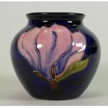 Moorcroft Magnolia on blue small vase: Height 7.5cm