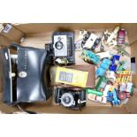 A mixed collection of items to include: Kodak sox -20 Brownie camera, Polaroid Square Shooter 2