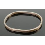 Hallmarked silver designer ladies bangle: Measures 62mm x 49mm internal, hinged with hidden catch.