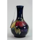Moorcroft vase in the Wisteria and Plums pattern: 15.5cm high, impressed mark and signed in blue.
