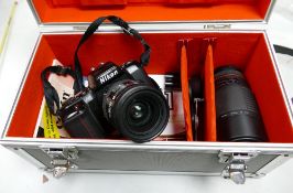 Hard Cased Nikon AF F-601 35mm Film Camera: Nikkor 28-85mm lens fitted, Sigma Zoom AF-APO 75-300mm