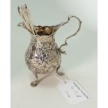 19th century silver cream jug and 6 coffee spoons: Gross weight 141g.