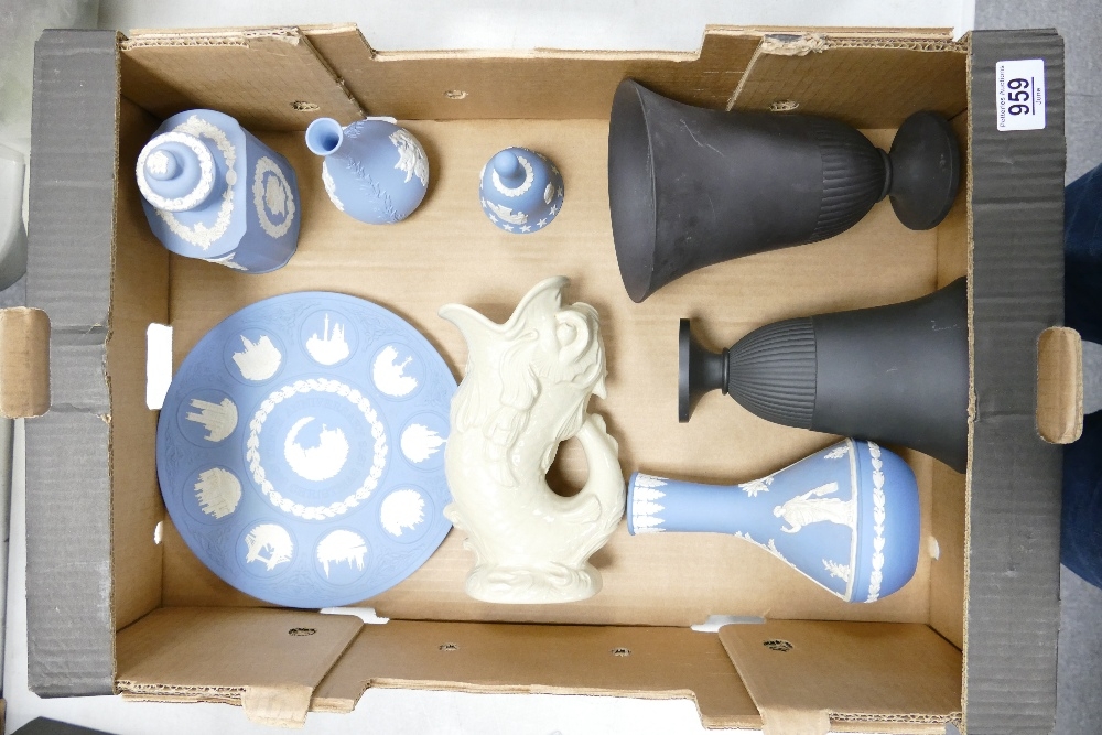 A collection of Wedgwood items to include: un finished black basalt vases, light blue vases &