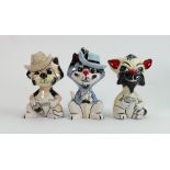 Three Lorna Bailey cats: 2 with guns, one with sword, tallest 13.25 cm (3)