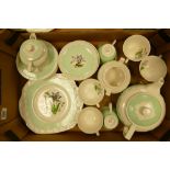 A collection of Wedgwood Hampton Court patterned teaware: nip noted to lip of spout of teapot, 22